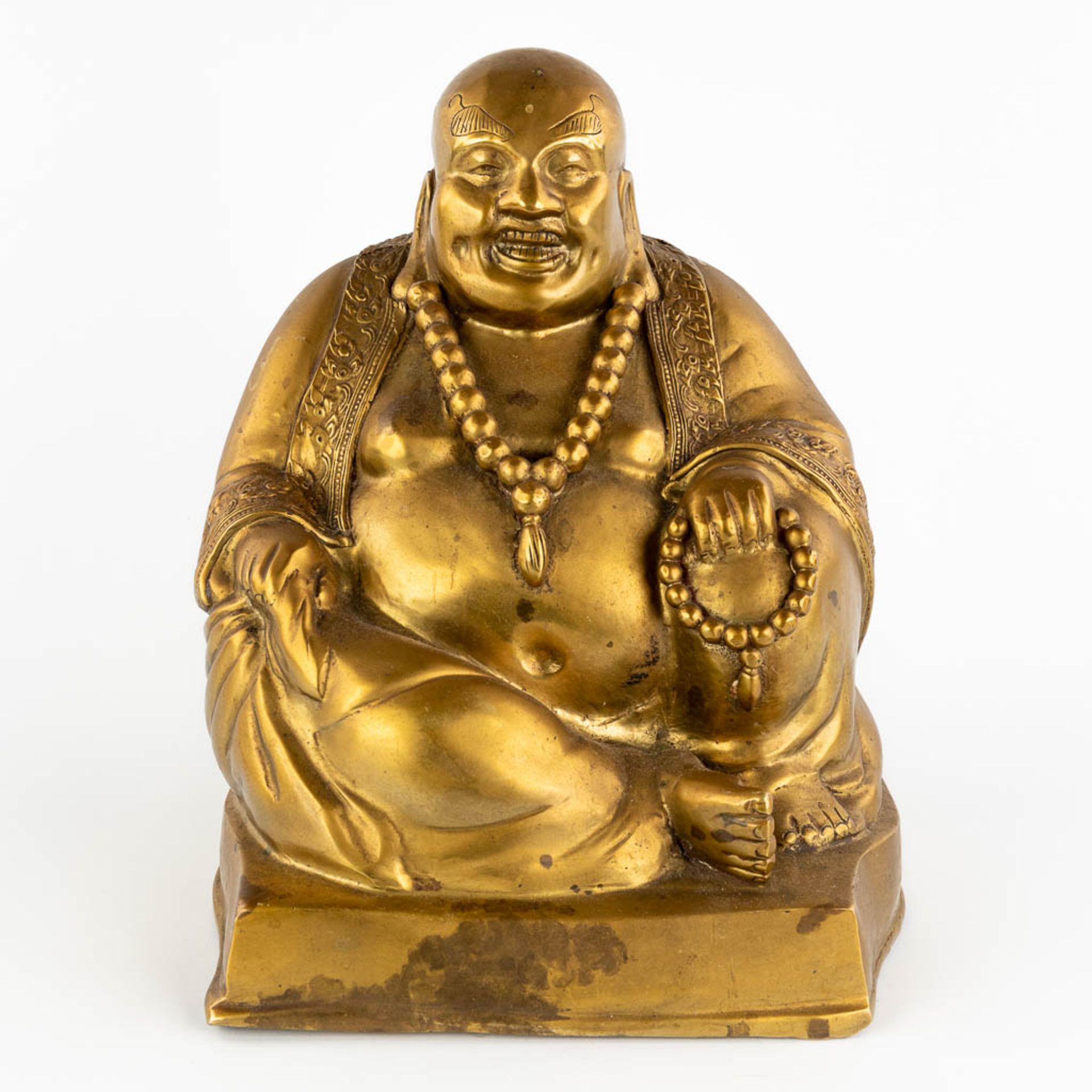 A Chinese laughing buddha, polished bronze. (L:27 x W:27 x H:34 cm)