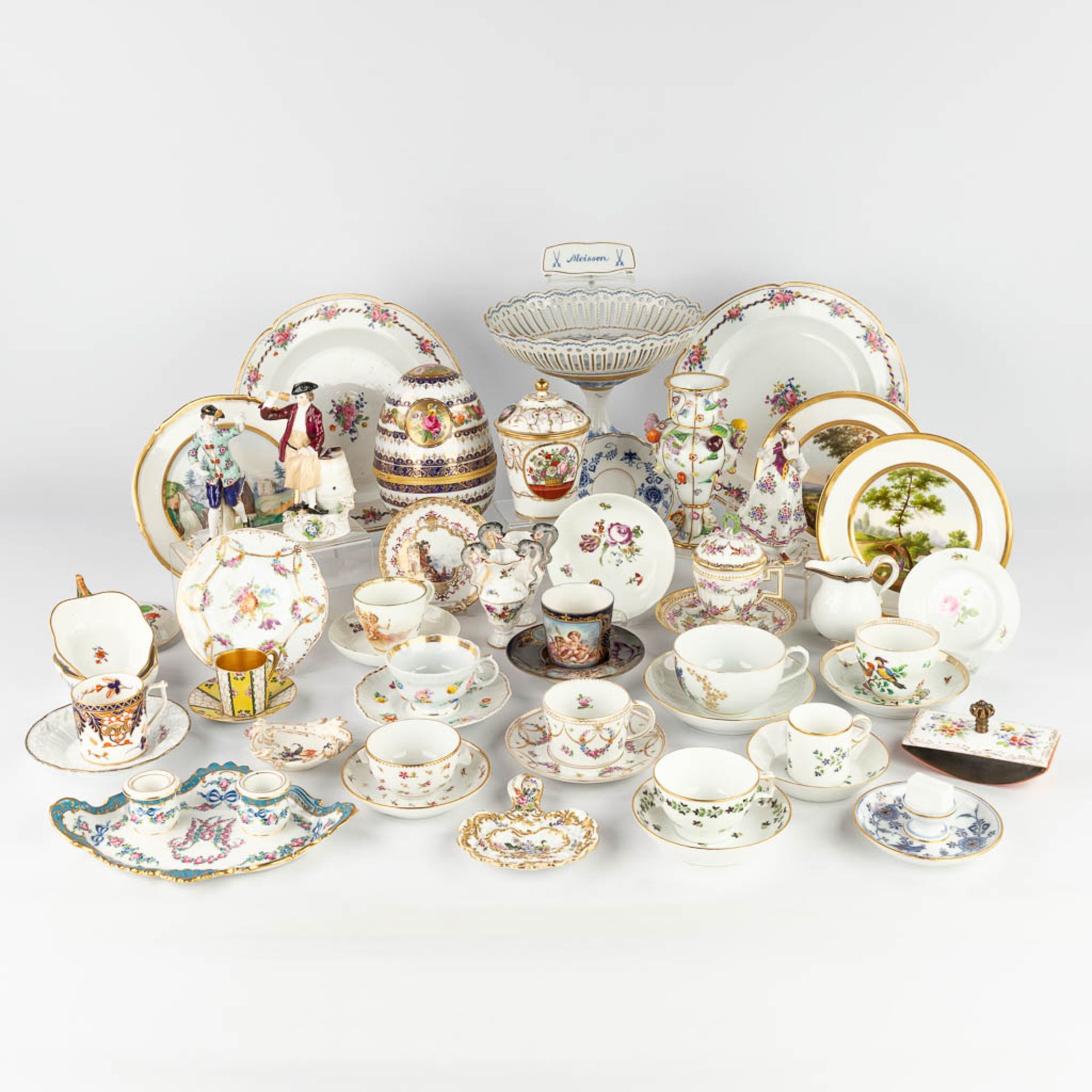 A large collection of porcelain items and table accessories of multiple marks. 19th and 20th C. (H:2