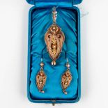A pendant and a pair of earrings, yellow and rose gold. 19th C. (W:3 x H:8 cm)