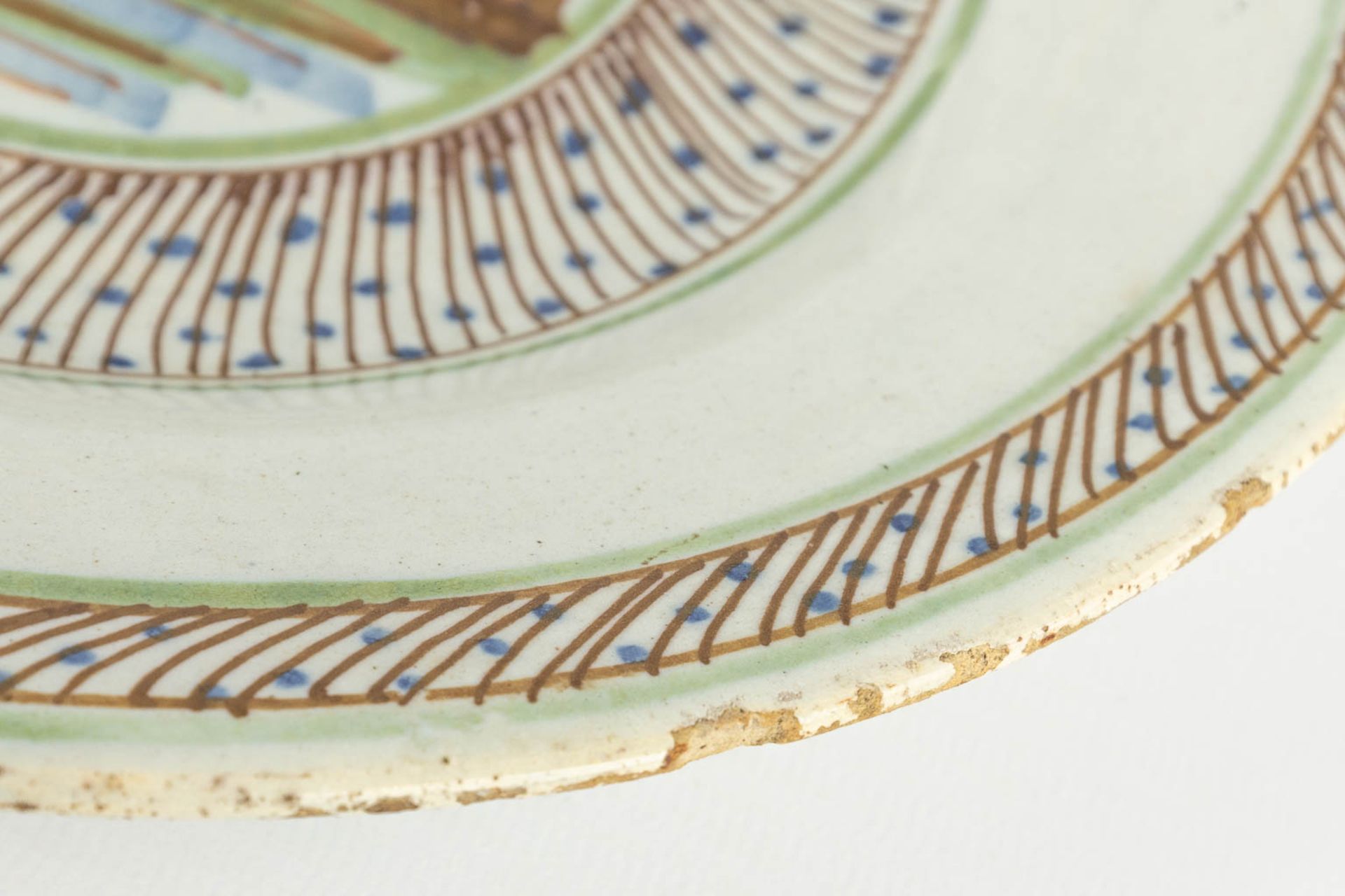 Three pieces of Delfts Faience, two plates with deer and a strainer. 18th C. (D:23 cm) - Image 11 of 18