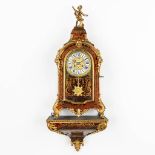 A Boulle cartel clock on a stand, tortoiseshell mounted with bronze, Napoleon 3, 19th C. (L:17 x W:3