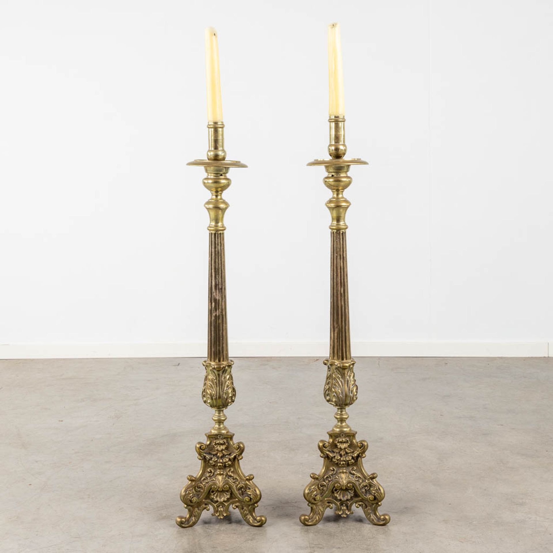 A pair of bronze church candlesticks/candle holders, Louis XV style. Circa 1900. (W:23 x H:105 cm)