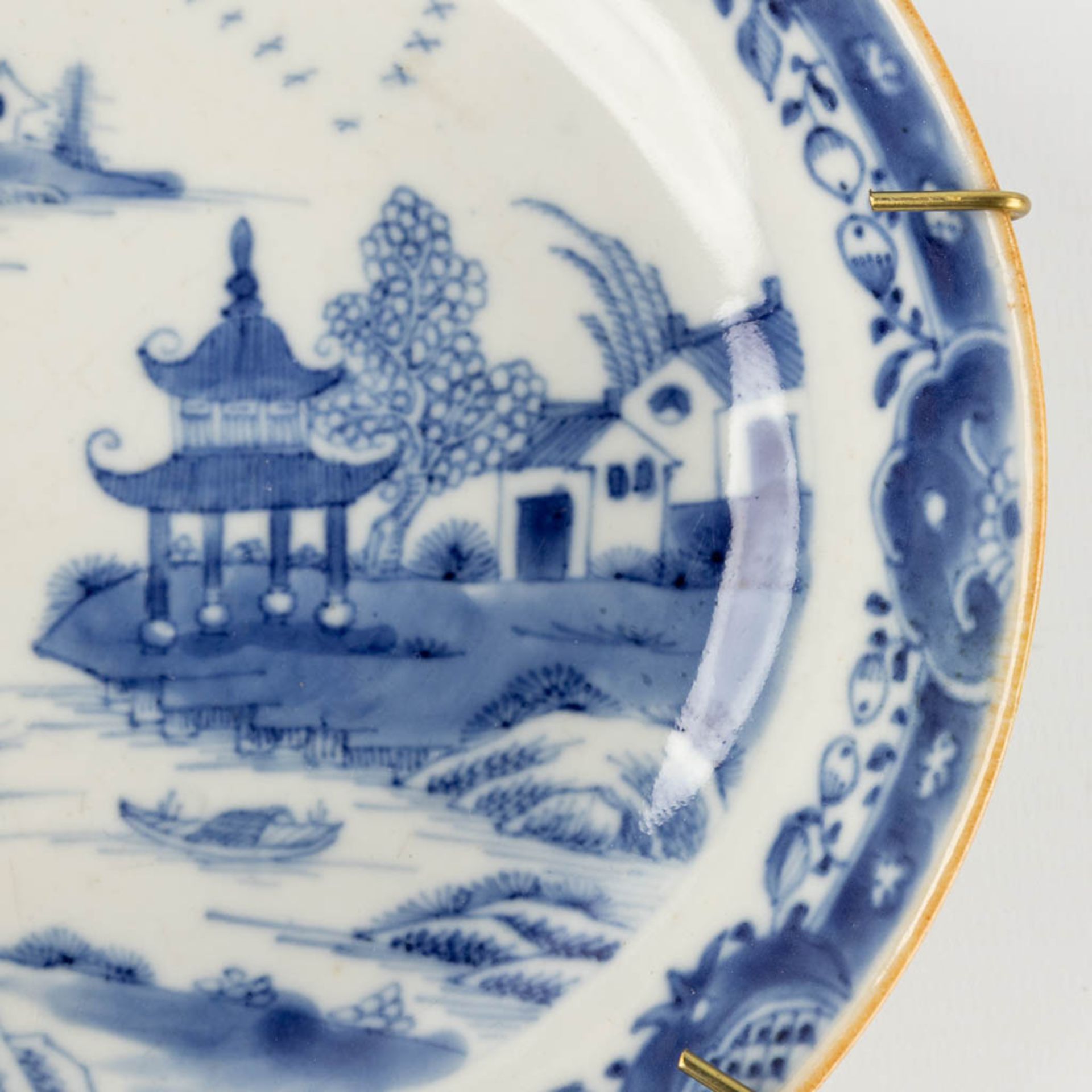 Two Chinese plates with blue-white landscape decor. 19th/20th C. (H:4 x D:16 cm) - Image 4 of 9