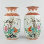 A pair of Chinese vases with bird decor, spring blossoms and peonies. 20th C. (H:32 x D:18 cm)