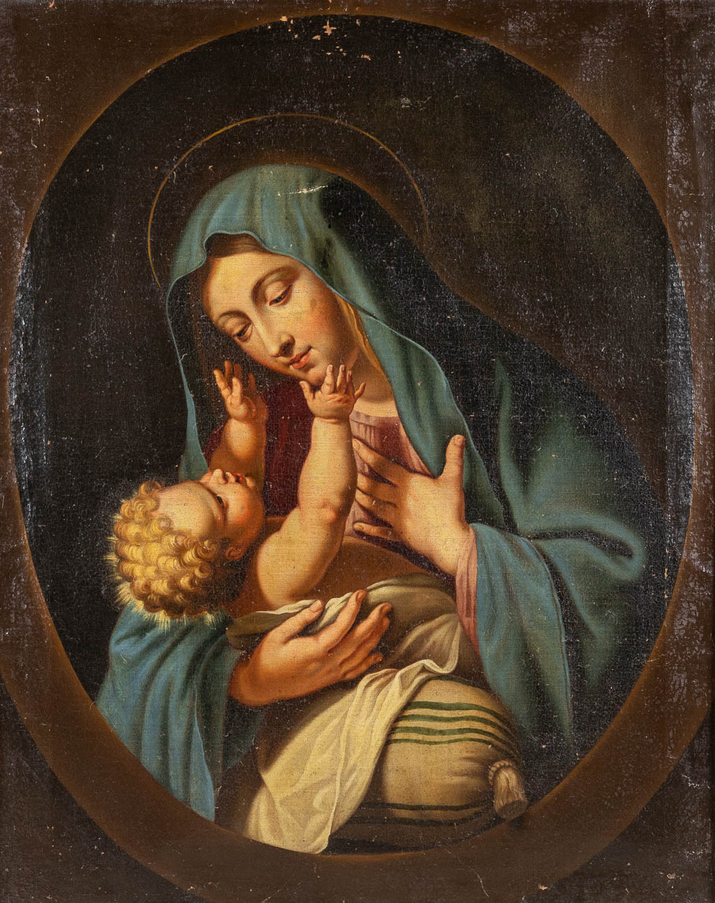 An antique painting 'Madonna with Jesus Christ', oil on canvas. 17th C. Italian School. (W:68 x H:85