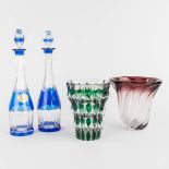 Val Saint Lambert, 4 pieces of coloured and cut crystal carafes and vases. (H:33 cm)