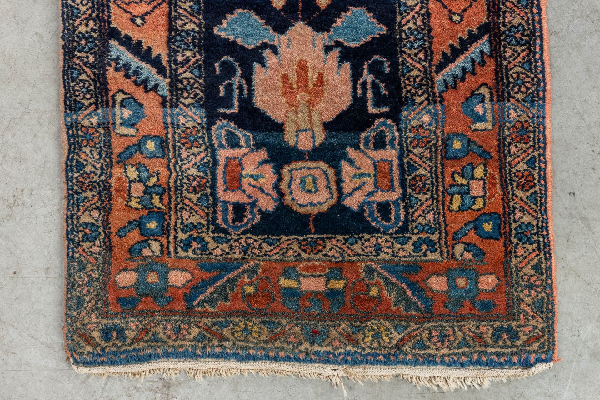 An Oriental hand-made runner. (L:73 x W:732 cm) - Image 11 of 13