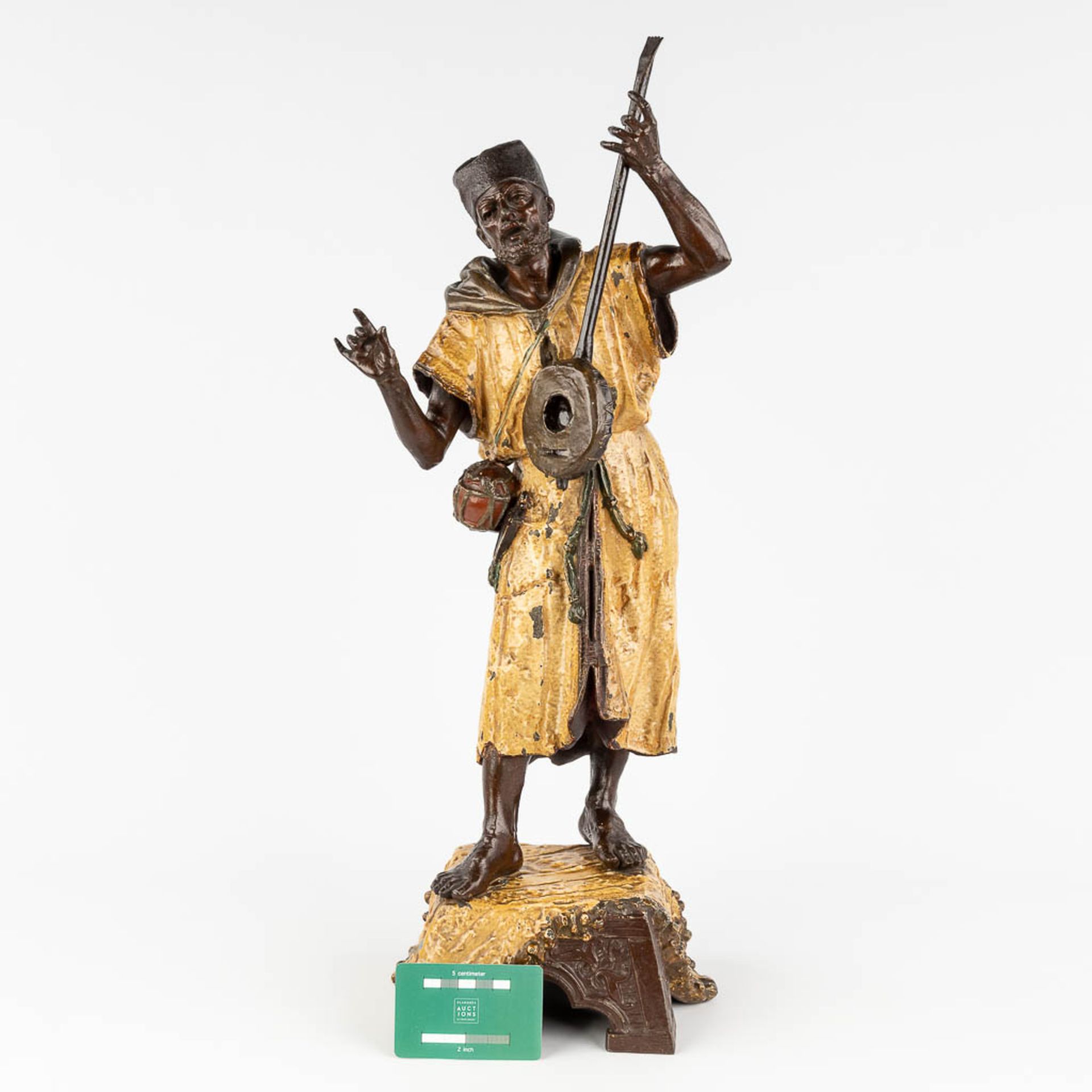 A large figurine of an Arab Bedouin, playing a musical instrument, patinated spelter. 19th C. (L:17, - Bild 2 aus 17