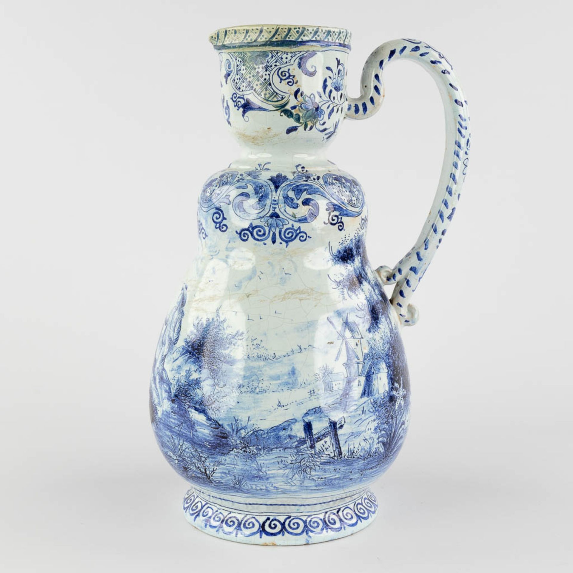 Delft, an antique pitcher with romantic scène, blue-white faience. 18th c. (L:17 x W:20 x H:33 cm) - Image 5 of 20