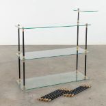 A mid-century shop rack, glass and metal. Circa 1960. (D:30 x W:90 x H:92 cm)