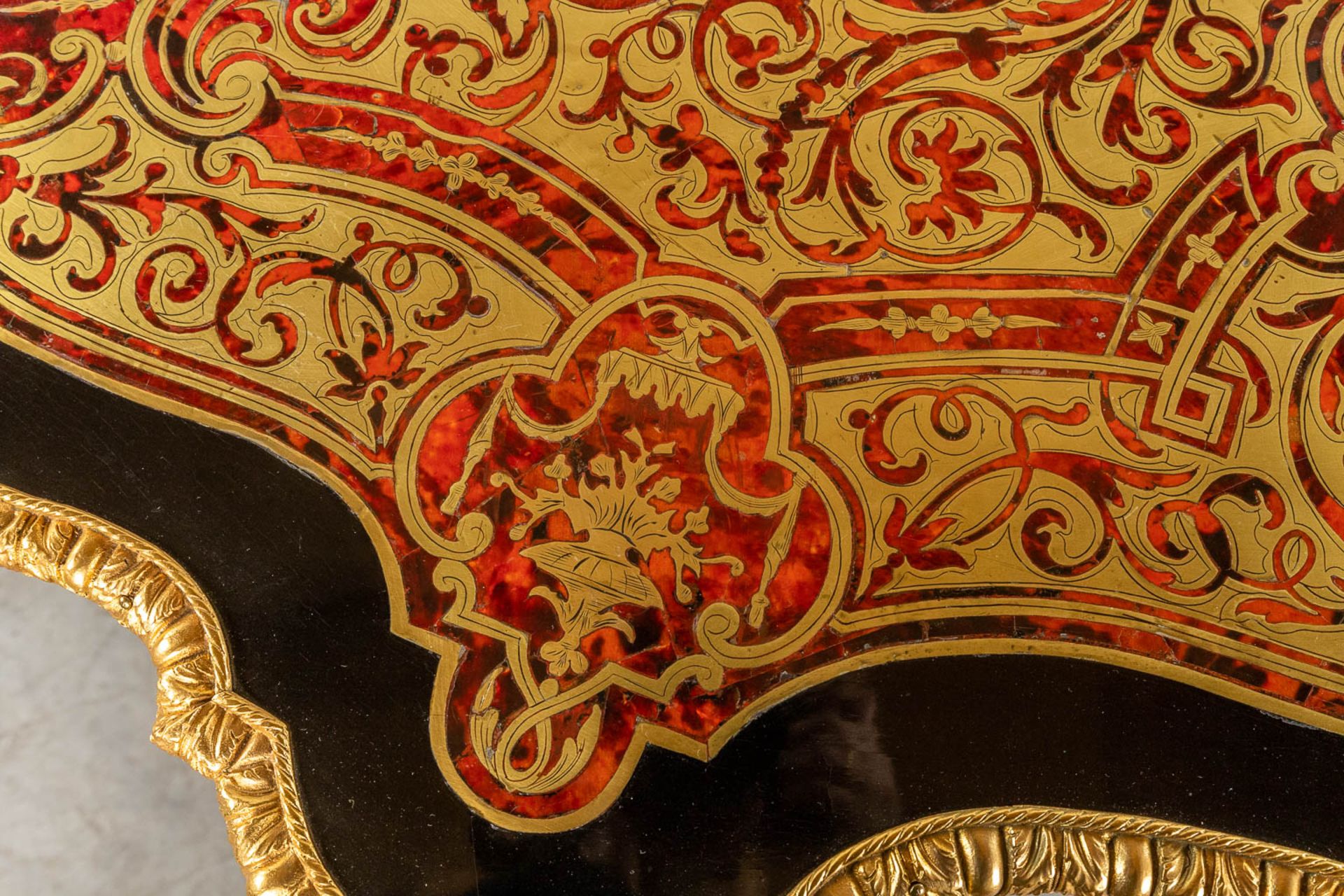 A Boulle 'Table Violon', tortoiseshell and copper inlay, Circa 1900. (D:77 x W:134 x H:77 cm) - Image 12 of 19