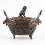 A bronze 'Brule Barfum', decorated with dragons and a foo dog. 19th/20th C. (D:9,5 x W:20,5 x H:17 c