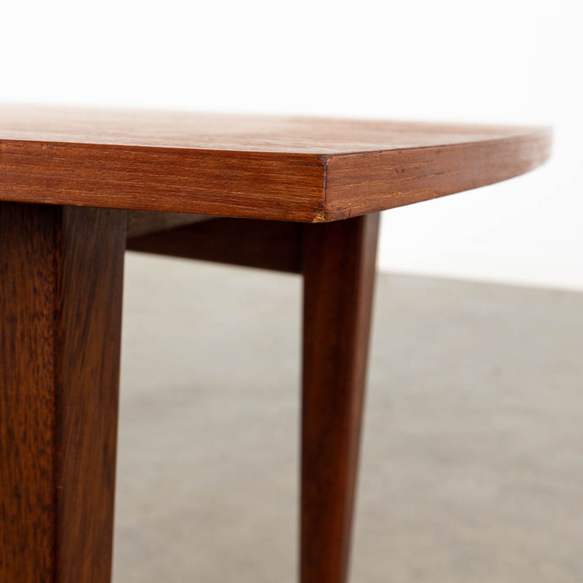 A mid-century Scandinavian coffee table, probably solid teak. (D:50 x W:120 x H:45 cm) - Image 10 of 10