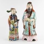 A Chinese figurine of a wise man, added another figurine. 20th C. (H:49 cm)