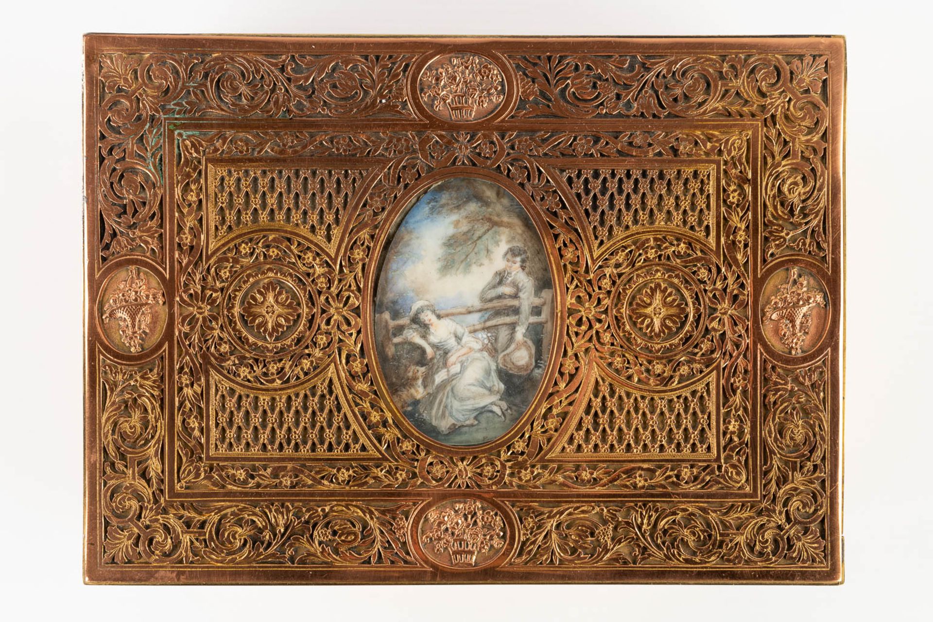 A jewellery box, ajoured brass and finished with a miniature painting. (D:16,7 x W:23 x H:6,5 cm) - Image 3 of 13