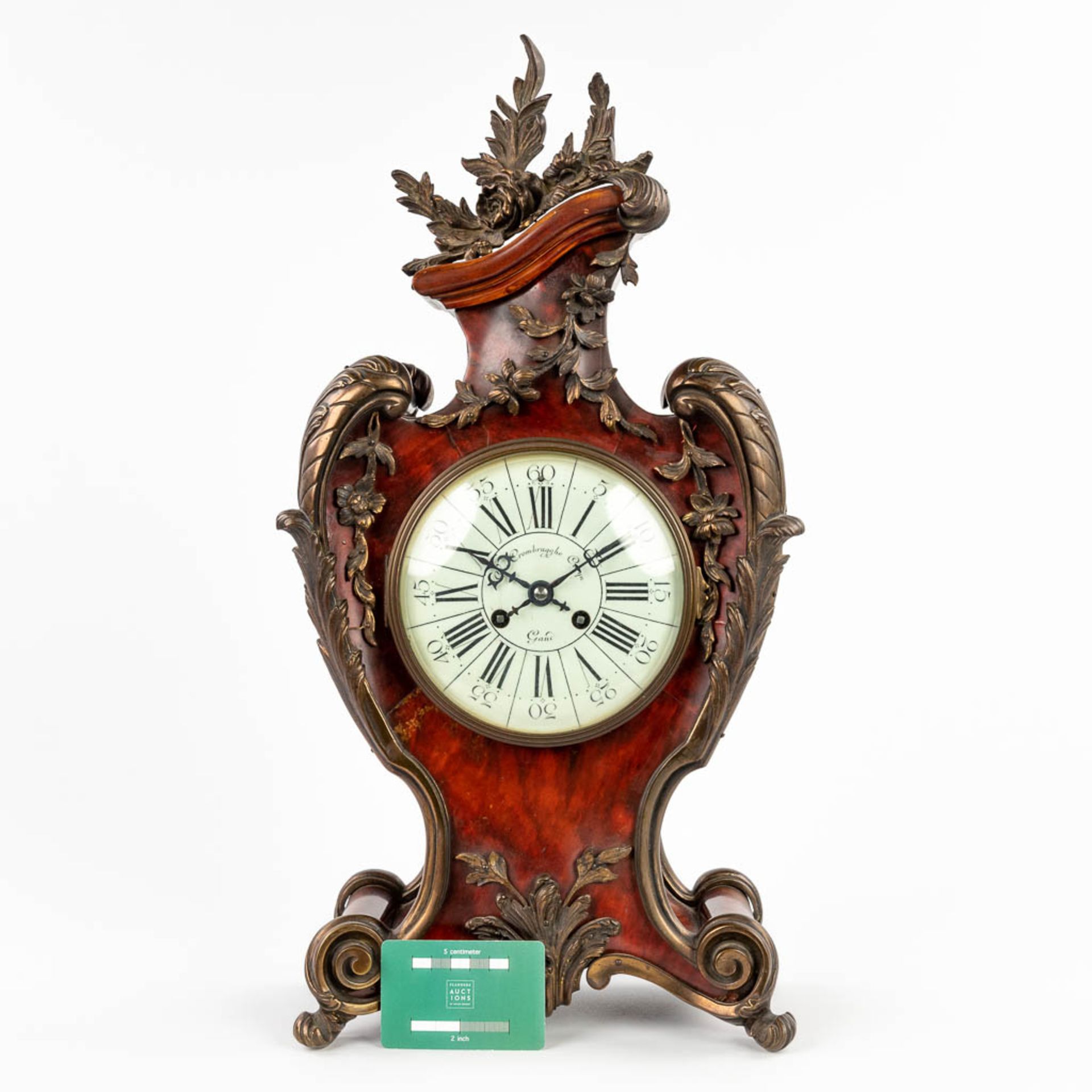 A mantle clock, tortoiseshell finished with gilt bronze in Louis XV style. 19th C. (D:14 x W:28 x H: - Bild 2 aus 12