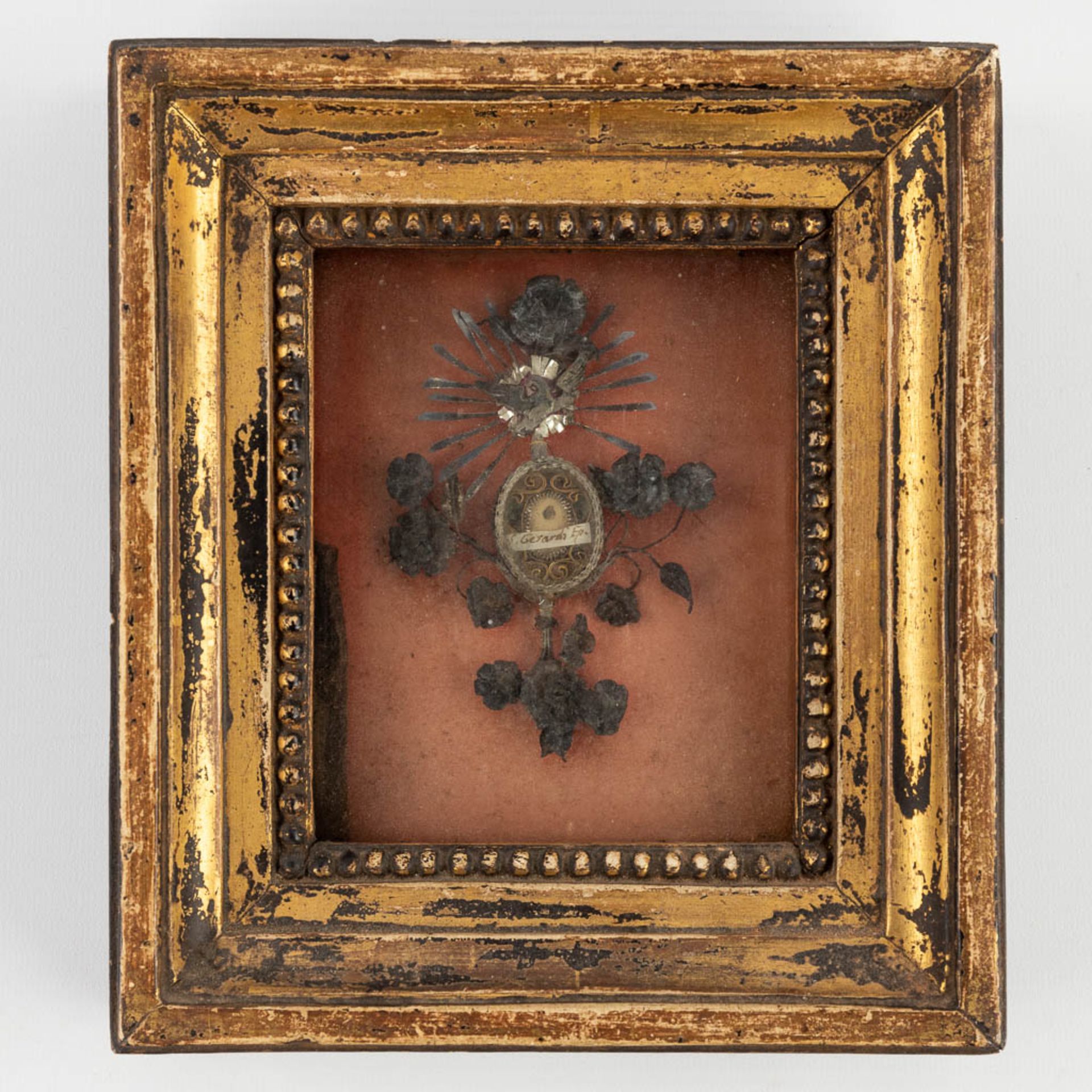 A frame with a sealed theca, a relic for St Gerardi Episcopus. Marked Pope Pius, 1788. (W:19 x H:21,