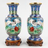 A pair of Chinese bronze cloisonné vases, decorated with cranes and flowers. 20th C. (H:39 x D:18 cm