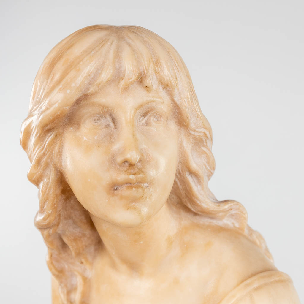 A statue of a lady, seated on a rock. Sculptured alabaster. 19th c. (D:27 x W:28 x H:88 cm) - Image 6 of 11