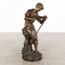 Mathurin MOREAU (1822-1912) 'Sharpening tools' patinated bronze (D:36 x W:34 x H:82 cm)