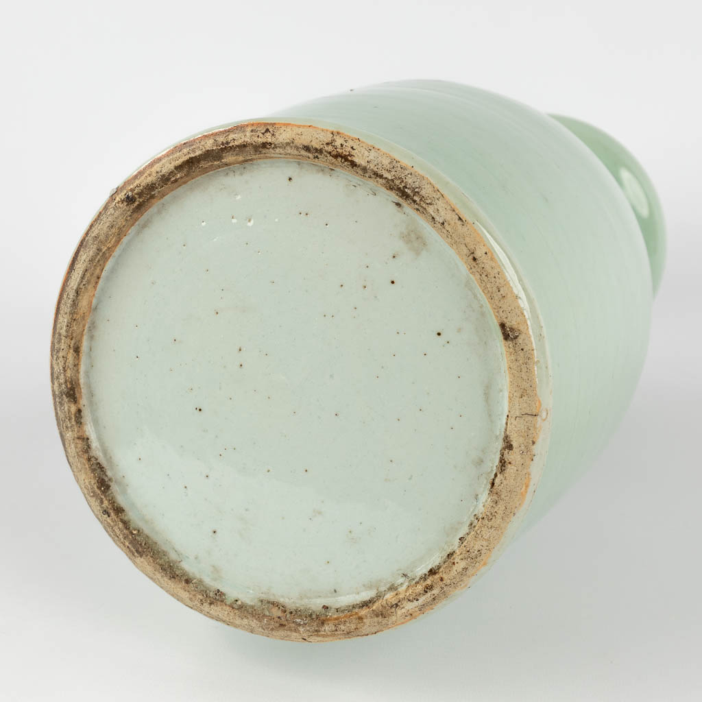 A Chinese celadon vase with blue-white decor of flora. 19th/20th C (H:42 x D:19 cm) - Image 7 of 12