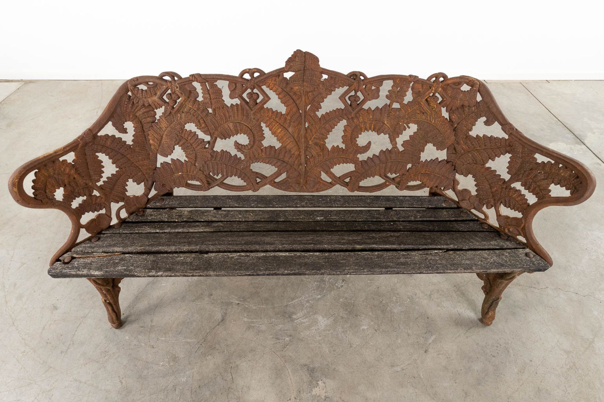 A cast-iron garden bench, decorated with fern leaves. 20th C. (D:53 x W:166 x H:88 cm) - Bild 8 aus 11