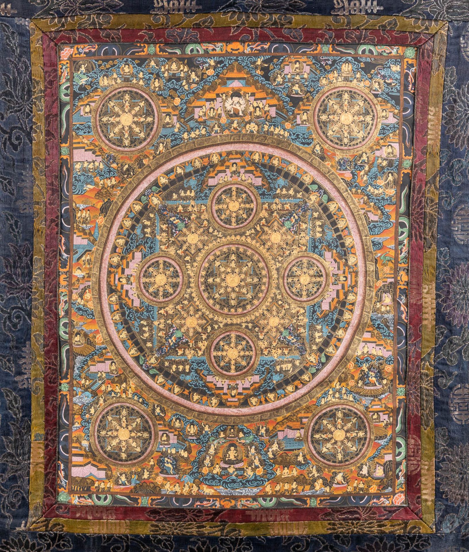 An Eastern Thangka, hand-painted decor on silk. (W:57 x H:74 cm) - Image 3 of 13
