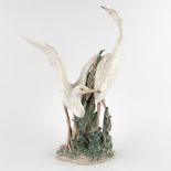 Lladro, 'Two Herons' glazed porcelain. 20th C. (D:36 x W:40 x H:57 cm)