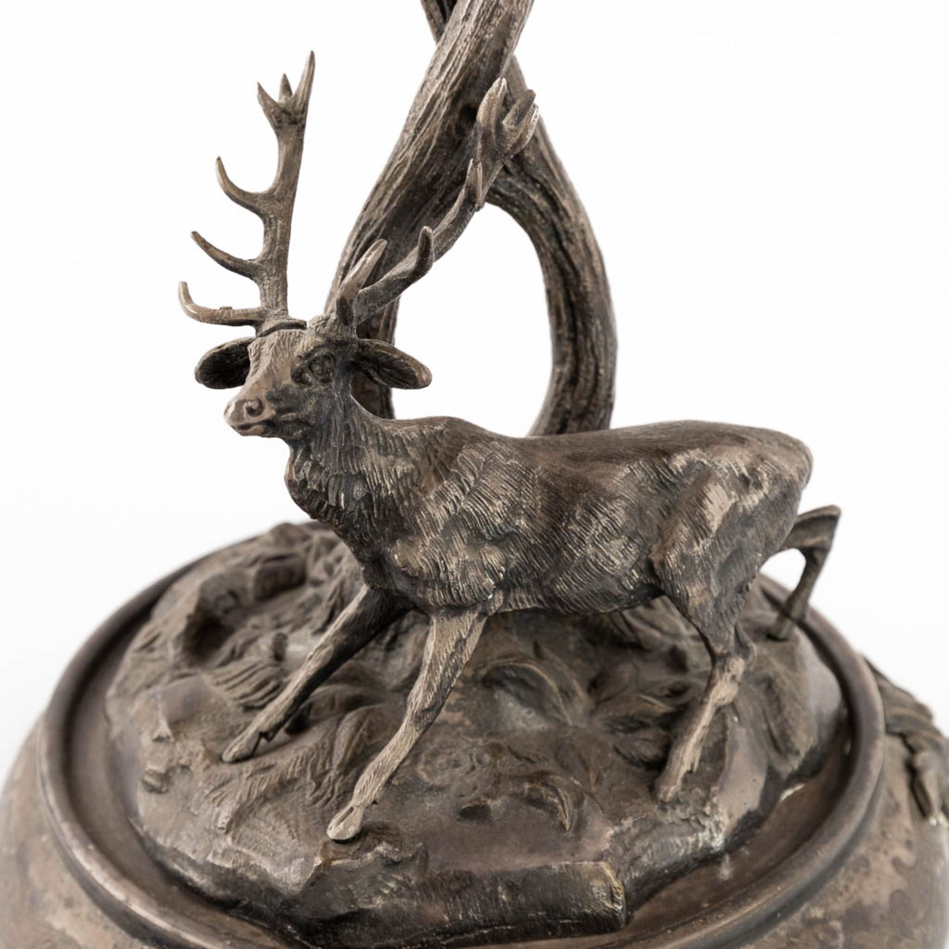 A figurine of a deer, walking under tall trees. Silver-plated bronze. Circa 1900. (D:24 x W:30 x H:3 - Image 10 of 13