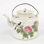 A Chinese tea pot decorated with birds and calligraphic texts. 19th/20th C. (D:12 x W:16 x H:13 cm)