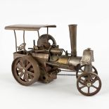 A miniature steam machine of a tractor. 20th C. (D:15 x W:32 x H:20 cm)