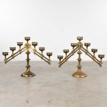 A pair of bronze candelabra with adjustable arms, and 7 candle holders. Decor of Fleur De Lis. (W:76