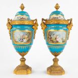 Sèvres, 'Bleu De Célèste', a pair of bronze-mounted ceramic vases with hand-painted decors. 19th C.