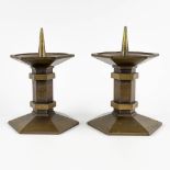 A pair of church candlesticks, bronze in art deco style. 20th C. (H:27 x D:17,5 cm)