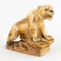 Figurine of a tiger, sculptured alabaster. 20th C. (D:13 x W:32 x H:27 cm)