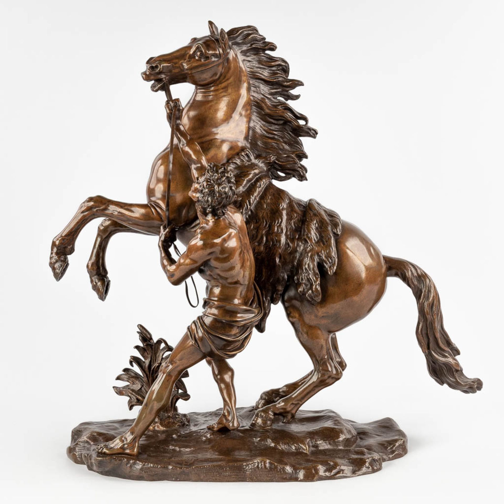 Guillaume I COUSTOU (1677-1746)(after), 'Marly horse' patinated bronze. (D:26 x W:56 x H:58 cm)