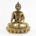 A decorative Thai buddha on a lotus flower, bronze, 20th C. (D:29 x W:42 x H:55 cm)