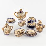 A 15-piece tea service, Satsuma stoneware, Meji period, Japan. Sarashina &amp; Shimazu Clan Crest (W