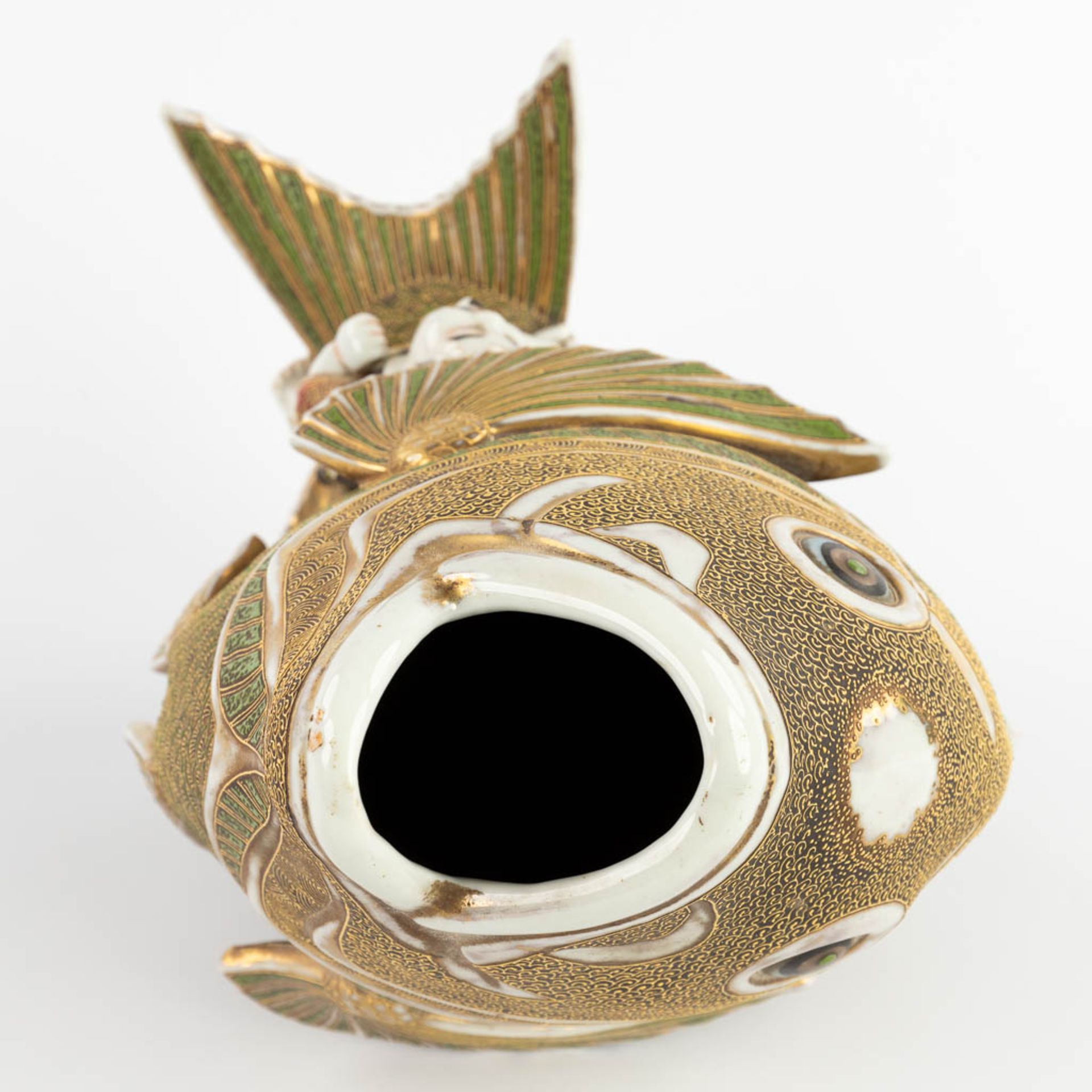 A figurine seaed on a koi, Satsuma stoneware. Meji period. (D:27 x W:26 x H:31 cm) - Image 9 of 11