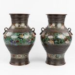 A pair of Oriental vases made of bronze with champslevé decor. (H:46 x D:30 cm)