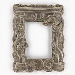 A Chinese picture frame, silver-plated, decorated with dragons near a temple entrance. 20th C. (W:19