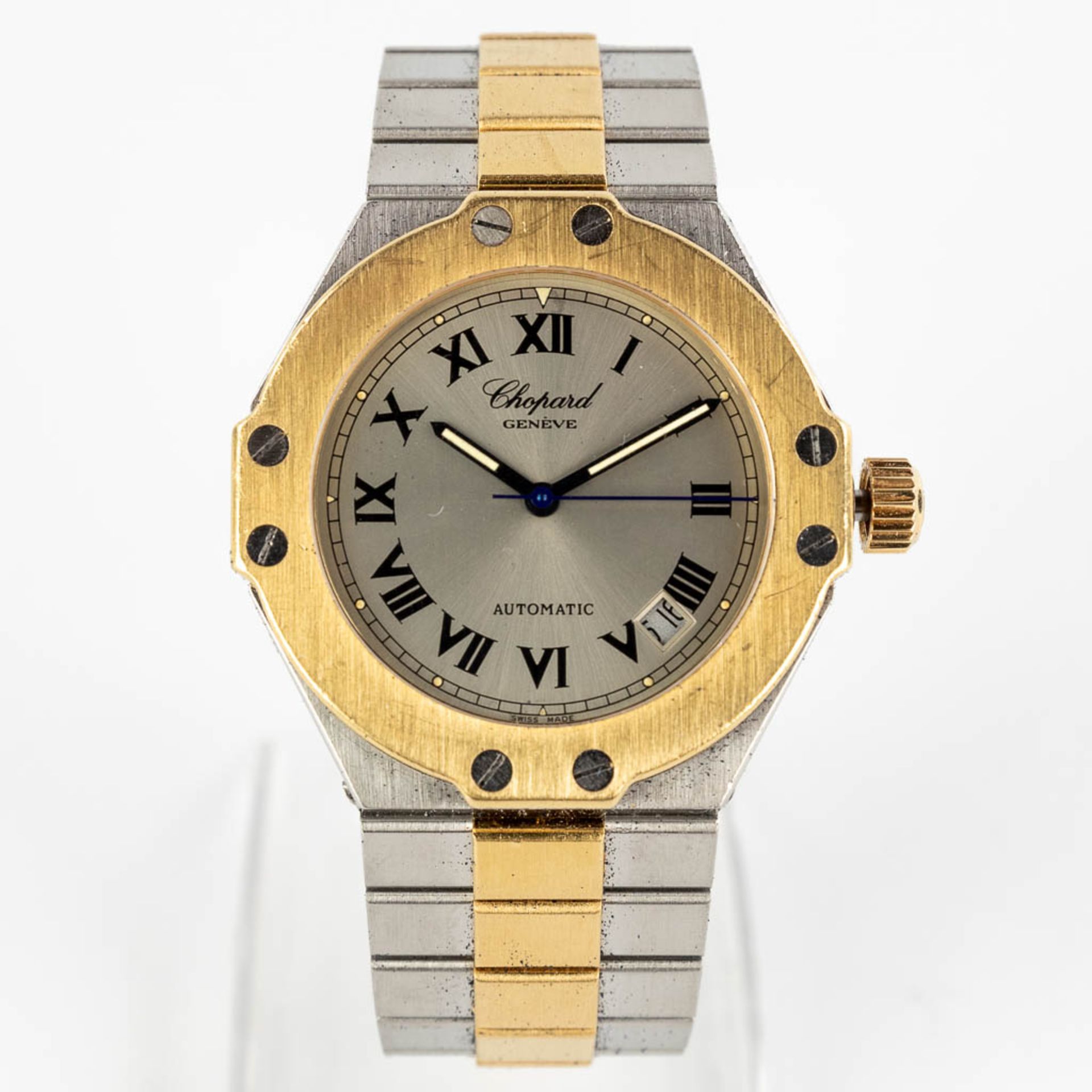 Chopard Saint Moritz, a men's wristwatch, 18kt yellow gold and steel. Box and papers. Reference 8300