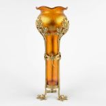 An art glass vase, brass mounted, art nouveau. In the style of Loetz-Witwe. (H:32 x D:11,5 cm)