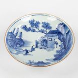 A Chinese bowl with a blue-white mountain landscape and figurines, Jiajing mark. 17th/18th C. (H:5 x