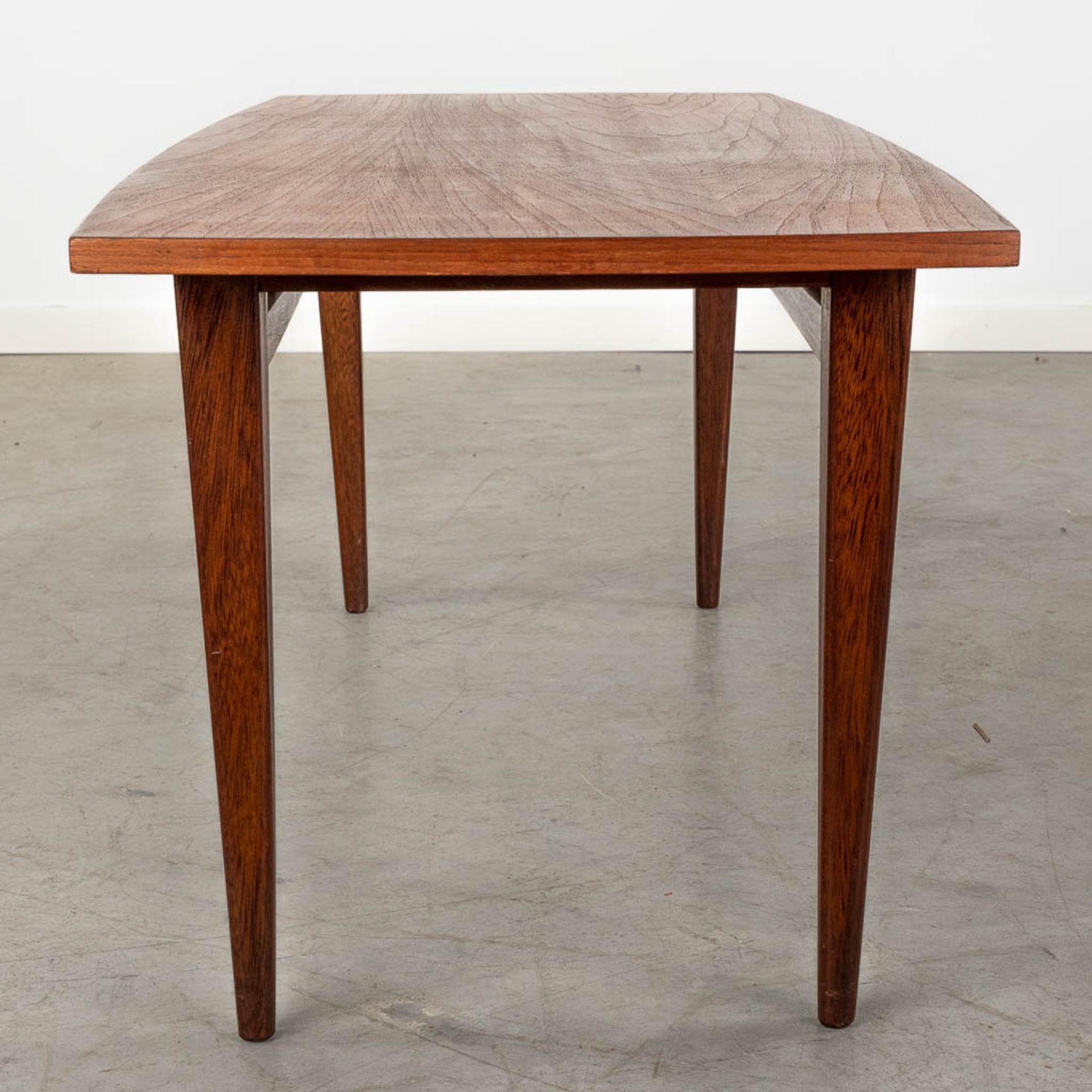 A mid-century Scandinavian coffee table, probably solid teak. (D:50 x W:120 x H:45 cm) - Image 6 of 10