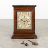 An antique English table clock with 3 gongs. Silver-plated dial and Snek movement. 19th C. (D:25 x W