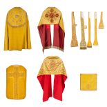 A cope, two humeral veils, a Roman Chasuble, finished with thick gold thread embroideries.