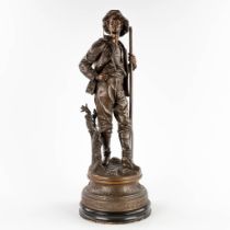 Emile BRUCHON (1806-1895) 'Man with a paddle' patinated spelter. (H:71 x D:24 cm)