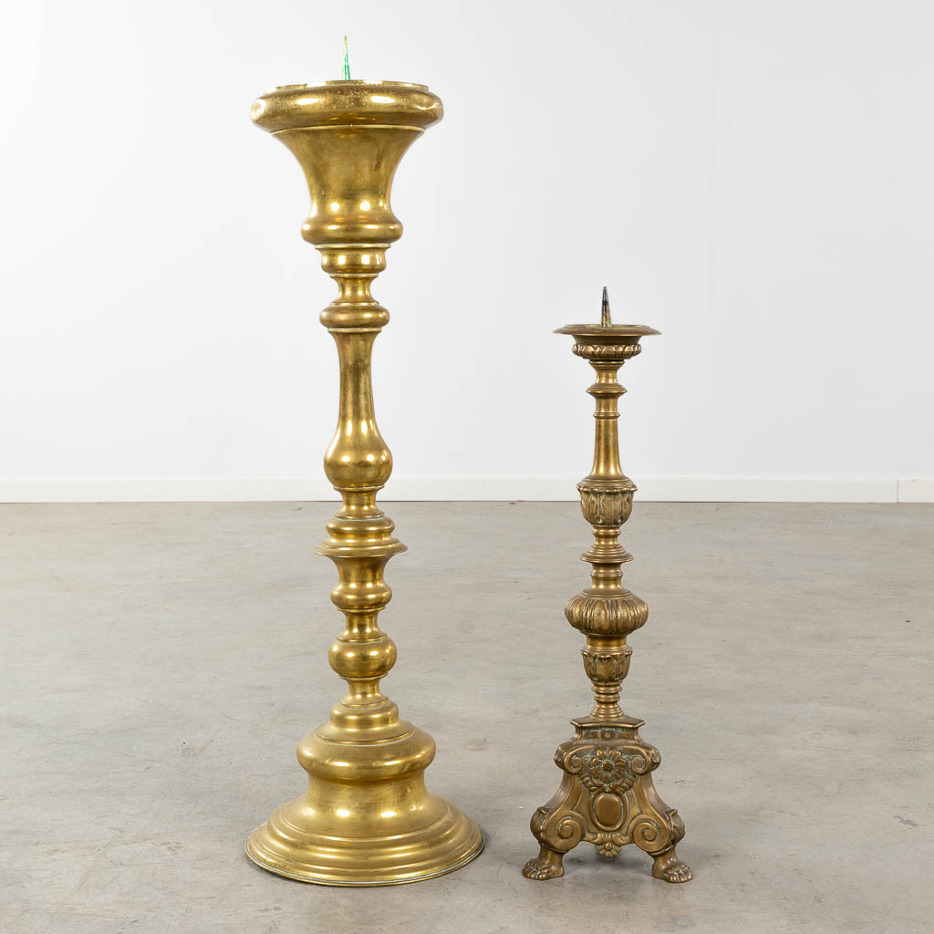 Two Church candlesticks, bronze and copper. 19th and 20th C. (H:94 x D:28 cm)