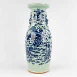 A Chinese celadon vase, blue-white, decorated with a Foo Dog. 19th/20th C. (H:59 x D:23 cm)